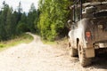 Jeep car 4Ãâ¦4 adventure travel. Old mountain dust road. Safari adventure. Copy space for text